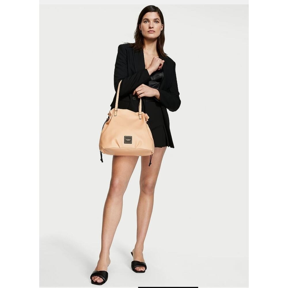 Victoria's Secret Beige Drawstring Tote Bag Faux Leather Shoulder Bag Logo Patch